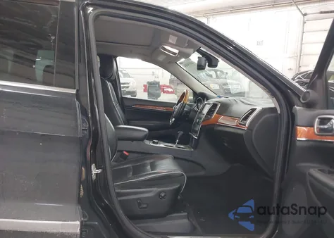 2012 Jeep Grand Cherokee Overland z USA, uszkodzony, nr VIN 1C4RJFCG4CC148784